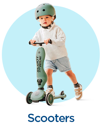 Toddler on a mint green scooter with three wheels and helmet.